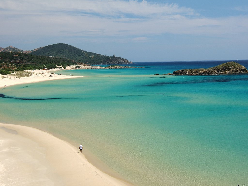 Chia coast with turquoise waters and panoramic headlands near Pula