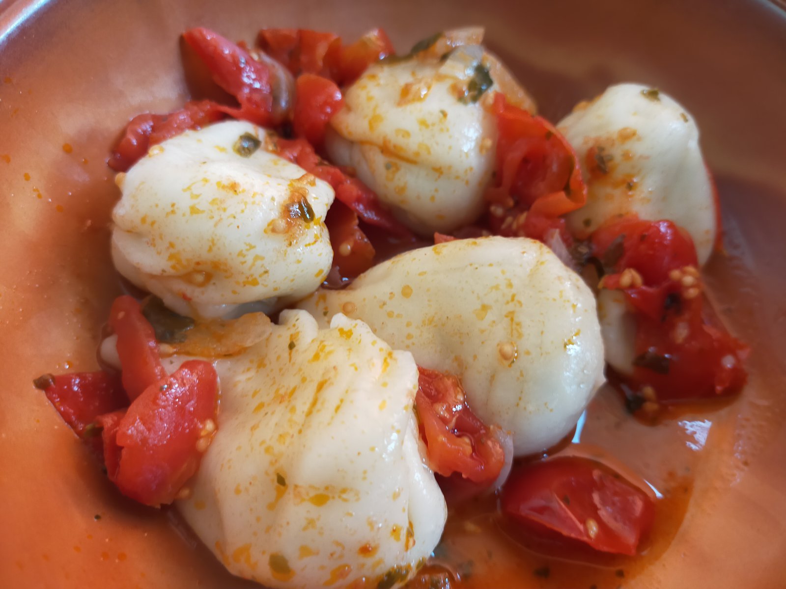 Handmade Sardinian Culurgiones pasta with intricate wheat-ear spighitta pinch